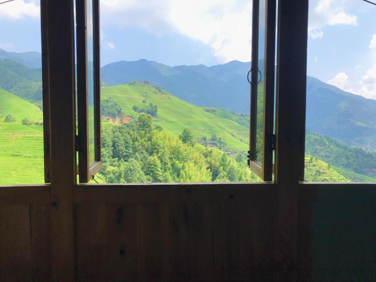 Dragon'S Den Hostel Longsheng Exterior foto